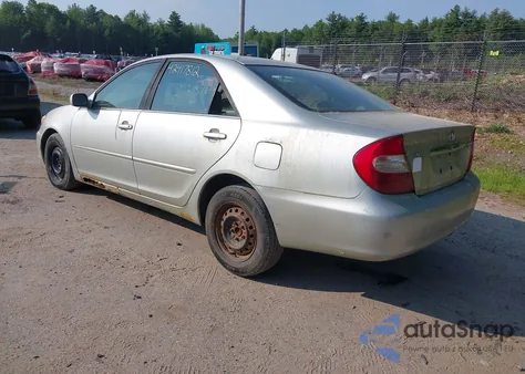 2003 Toyota Camry Le z USA, uszkodzony, nr VIN JTDBE32K330175311